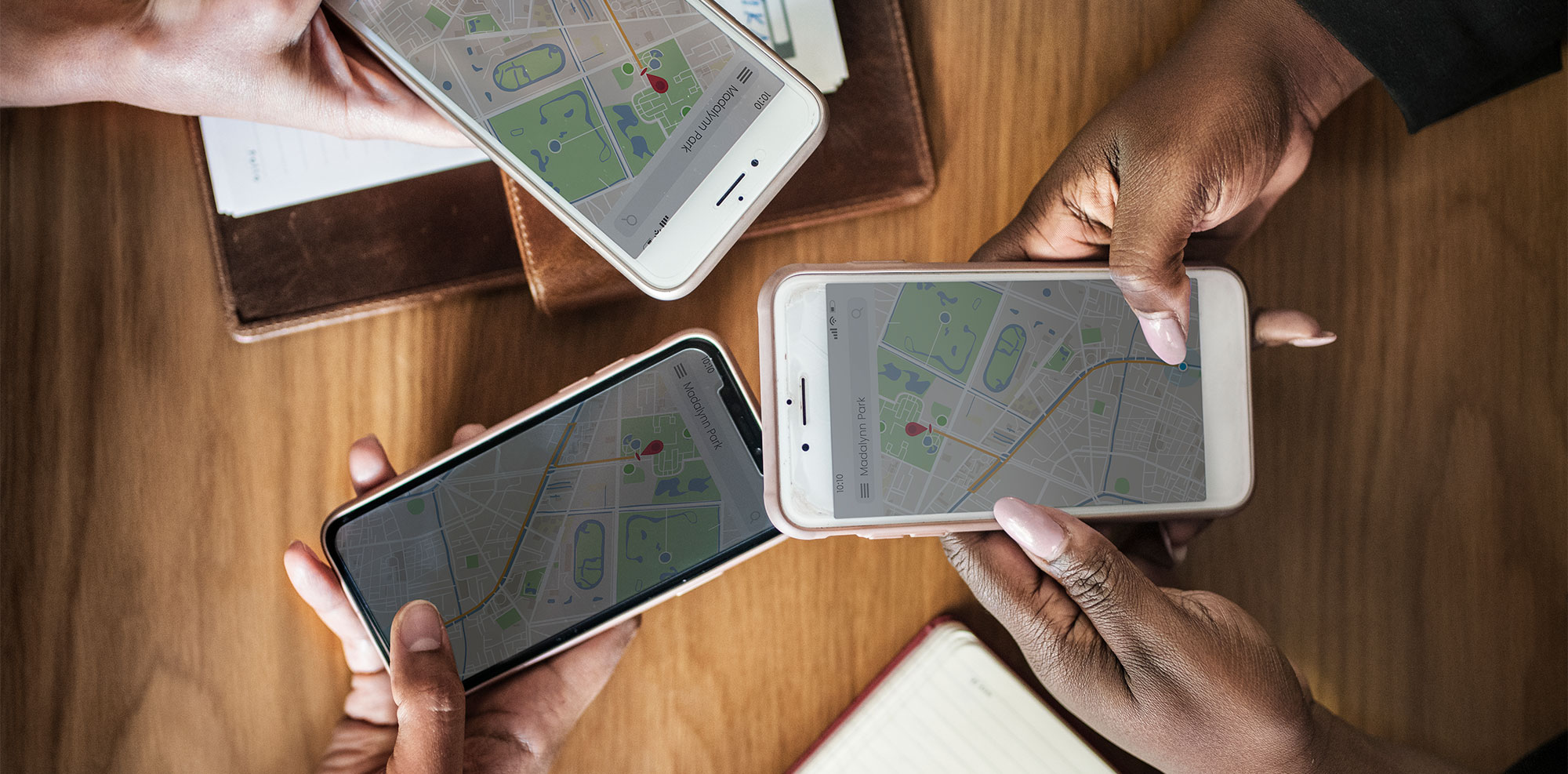 business people using maps phones business people using maps phones
